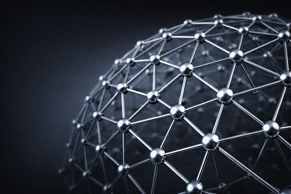 Metallic lattice framework illustrating interconnected structural nodes representing the architecture of the Interface International portfolio.
